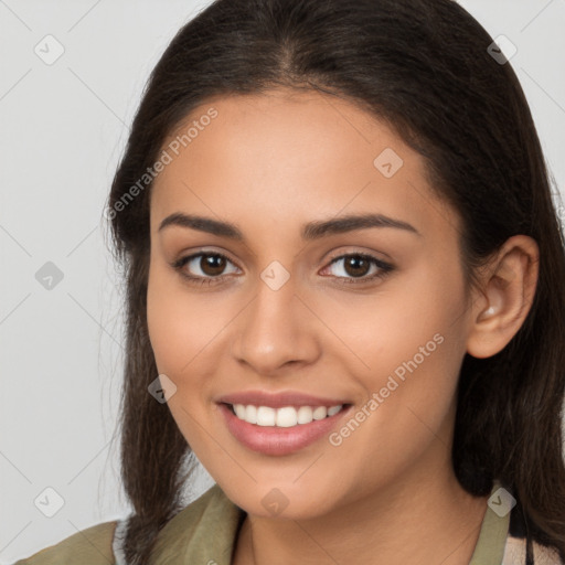 Joyful latino young-adult female with medium  brown hair and brown eyes