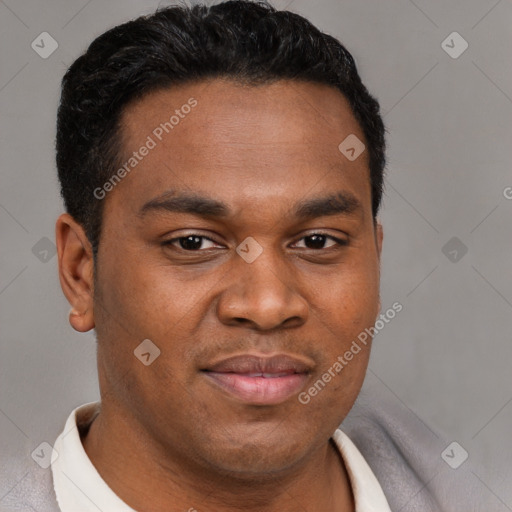 Joyful latino young-adult male with short  brown hair and brown eyes