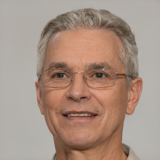 Joyful white middle-aged male with short  gray hair and brown eyes