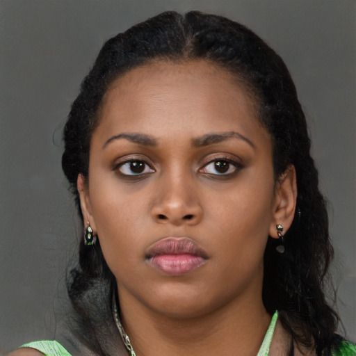 Neutral black young-adult female with long  black hair and brown eyes
