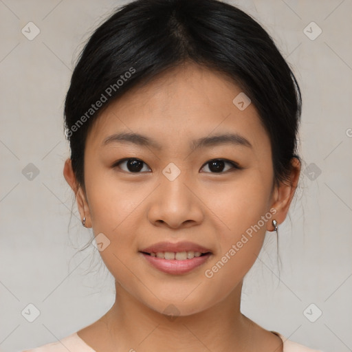 Joyful asian young-adult female with medium  brown hair and brown eyes