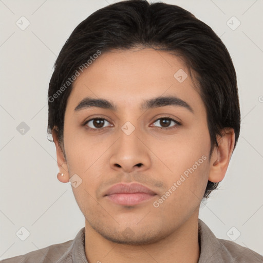 Neutral latino young-adult male with short  brown hair and brown eyes