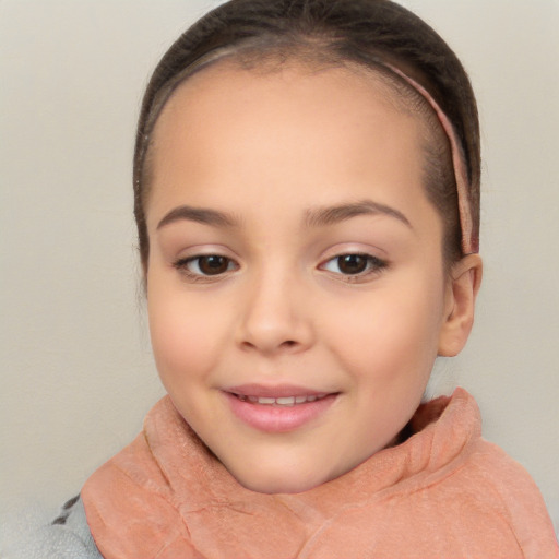 Joyful white child female with short  brown hair and brown eyes