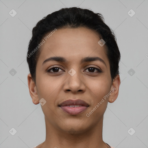 Joyful latino young-adult female with short  black hair and brown eyes