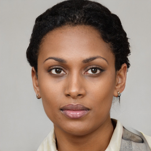 Neutral black young-adult female with short  black hair and brown eyes