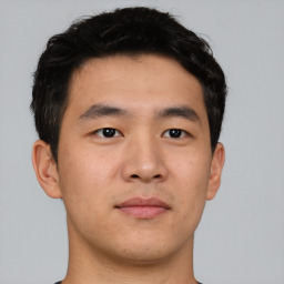 Neutral asian young-adult male with short  brown hair and brown eyes