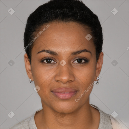 Joyful black young-adult female with short  black hair and brown eyes