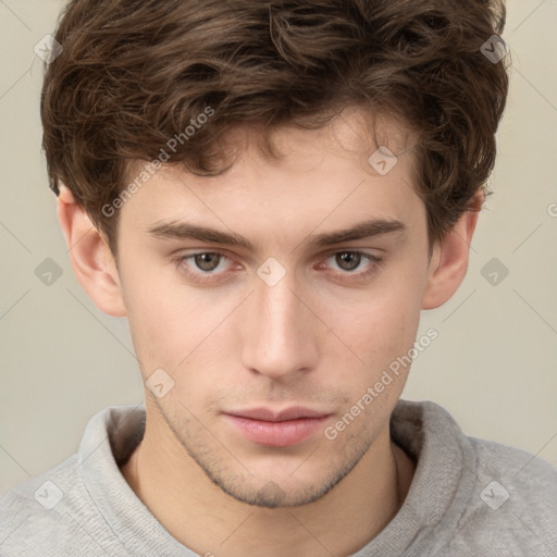 Neutral white young-adult male with short  brown hair and grey eyes