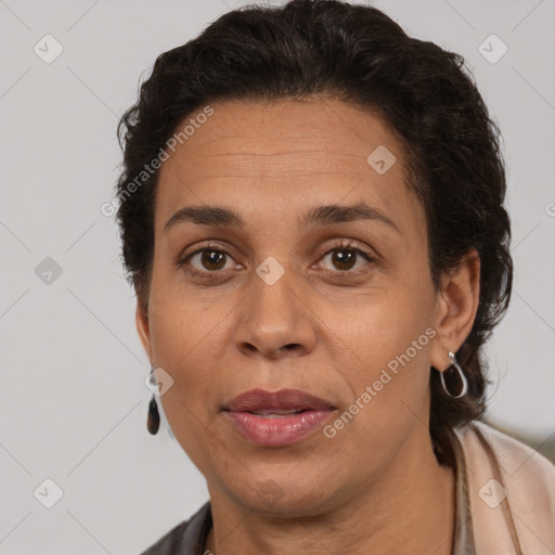 Joyful white adult female with short  brown hair and brown eyes