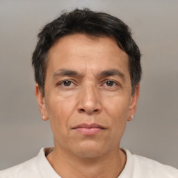 Neutral white adult male with short  brown hair and brown eyes