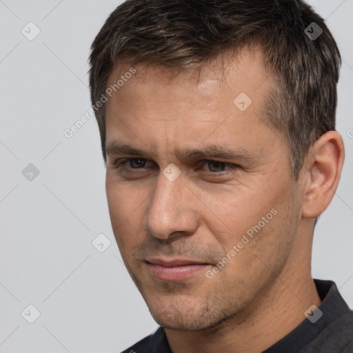 Neutral white adult male with short  brown hair and brown eyes