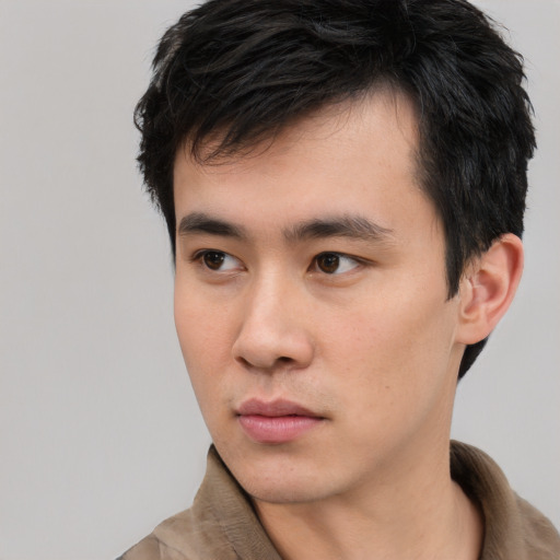 Neutral white young-adult male with short  black hair and brown eyes