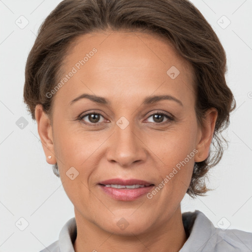 Joyful white adult female with short  brown hair and brown eyes