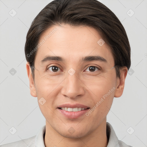 Joyful white young-adult male with short  brown hair and brown eyes