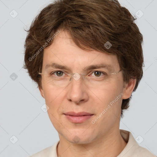 Joyful white adult male with short  brown hair and grey eyes