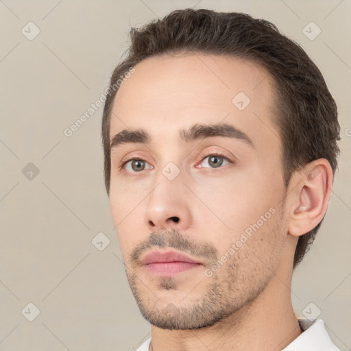 Neutral white young-adult male with short  brown hair and brown eyes