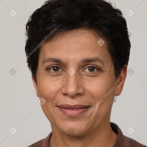 Joyful white adult female with short  brown hair and brown eyes