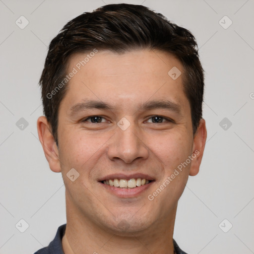 Joyful white young-adult male with short  brown hair and brown eyes