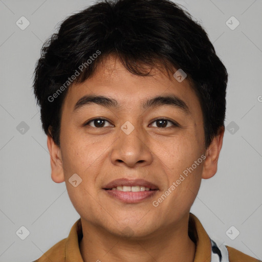 Joyful asian young-adult male with short  brown hair and brown eyes