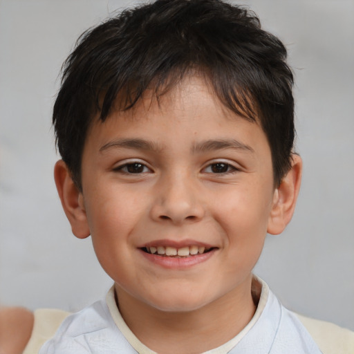 Joyful white child male with short  brown hair and brown eyes