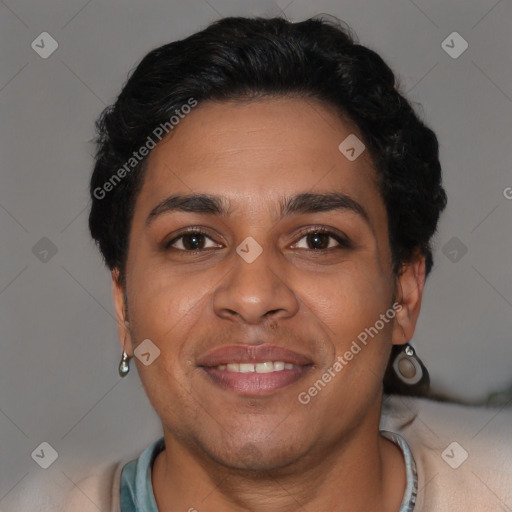 Joyful latino young-adult male with short  brown hair and brown eyes