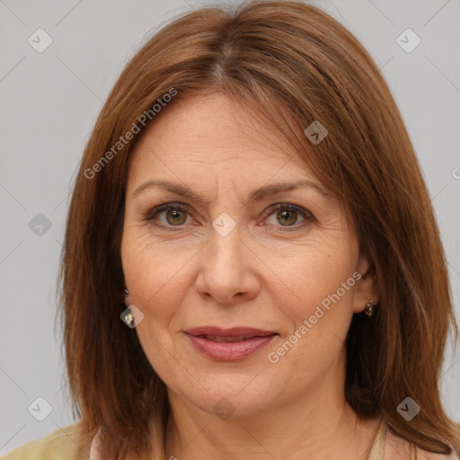 Joyful white adult female with medium  brown hair and brown eyes