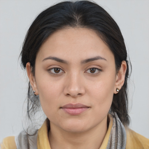 Joyful asian young-adult female with medium  brown hair and brown eyes