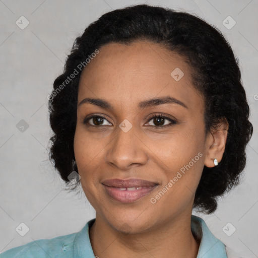 Joyful black young-adult female with medium  black hair and brown eyes