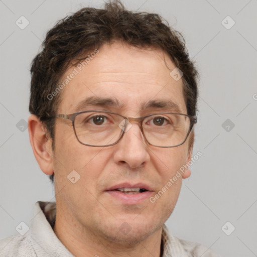 Joyful white middle-aged male with short  brown hair and brown eyes