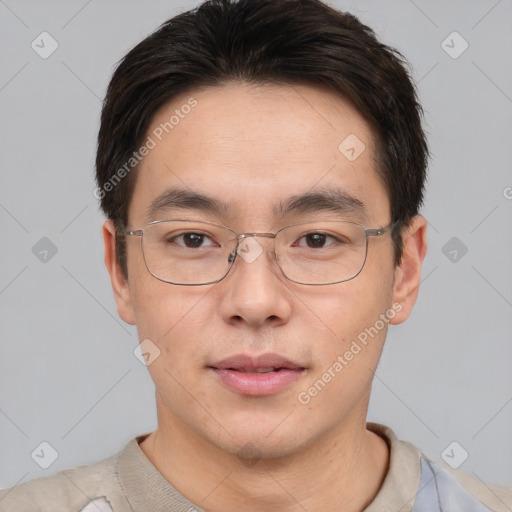 Neutral asian young-adult male with short  brown hair and brown eyes