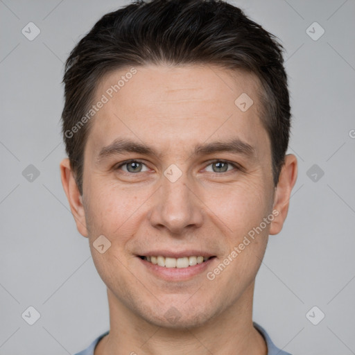 Joyful white adult male with short  brown hair and brown eyes