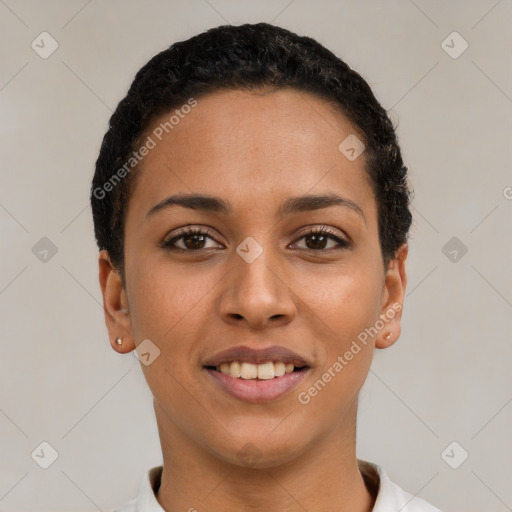 Joyful latino young-adult female with short  black hair and brown eyes