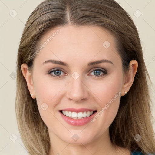 Joyful white young-adult female with long  brown hair and grey eyes