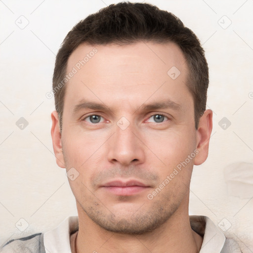 Neutral white young-adult male with short  brown hair and brown eyes