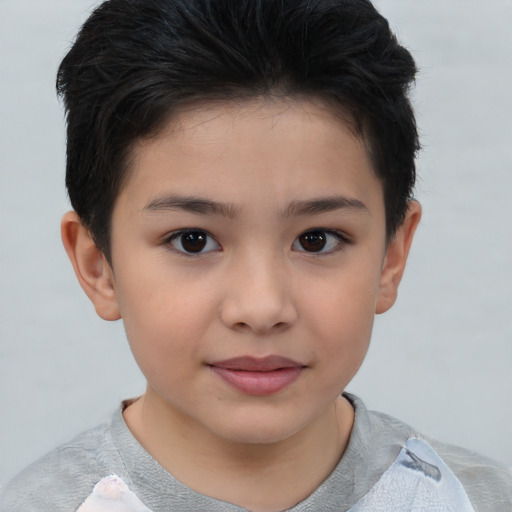 Joyful asian child female with short  brown hair and brown eyes