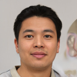 Neutral asian young-adult male with short  brown hair and brown eyes