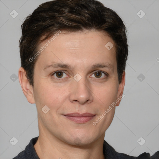 Joyful white adult male with short  brown hair and grey eyes