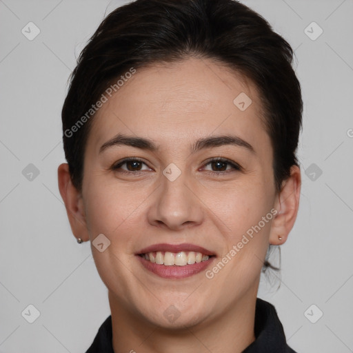 Joyful white young-adult female with short  brown hair and brown eyes