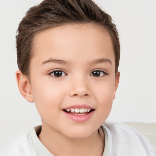 Joyful white child female with short  brown hair and brown eyes