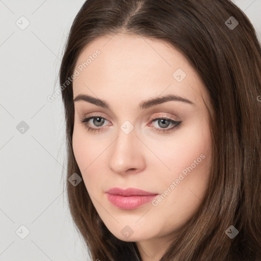 Neutral white young-adult female with long  brown hair and brown eyes