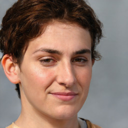 Joyful white young-adult male with medium  brown hair and brown eyes