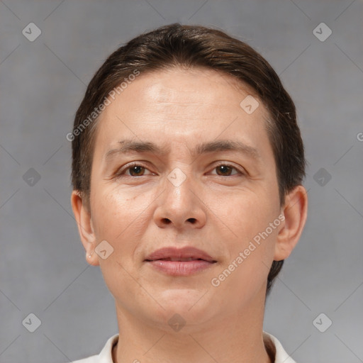 Joyful white adult female with short  brown hair and brown eyes