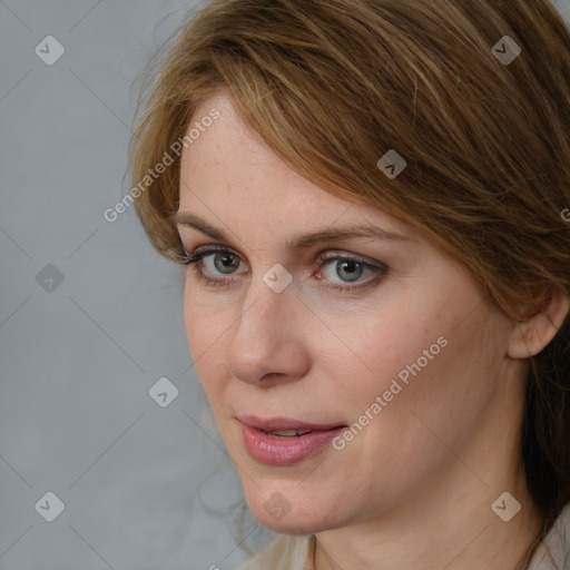 Joyful white young-adult female with medium  brown hair and blue eyes