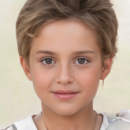 Joyful white child female with short  brown hair and brown eyes