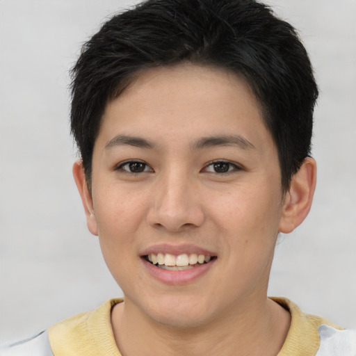 Joyful asian young-adult female with short  brown hair and brown eyes