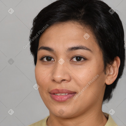 Joyful asian young-adult female with medium  brown hair and brown eyes