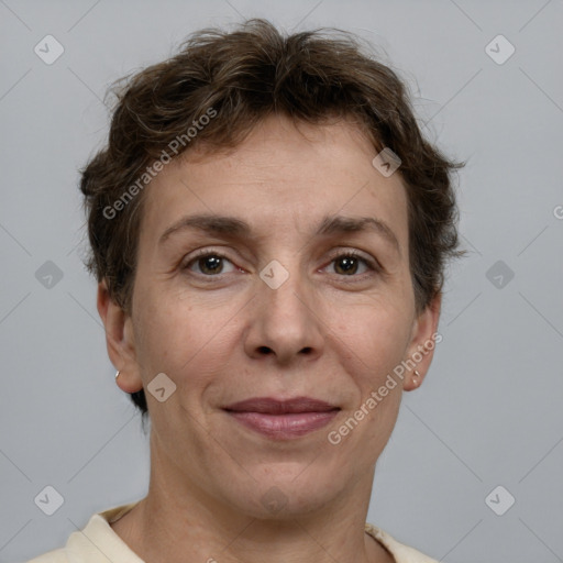 Joyful white adult female with short  brown hair and brown eyes