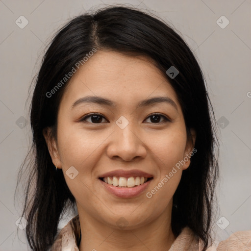 Joyful latino young-adult female with medium  brown hair and brown eyes