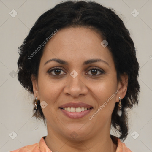 Joyful latino adult female with short  brown hair and brown eyes