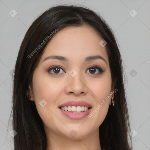 Joyful asian young-adult female with long  brown hair and brown eyes